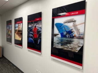Row of illuminated light boxes with printed graphics installed by Barjo Printing & Signs